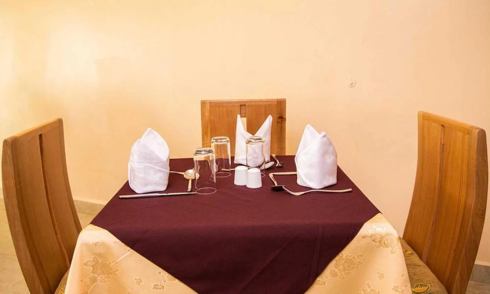 Table setup Photo Emmaus Guest House Kampala - Uganda Central Region