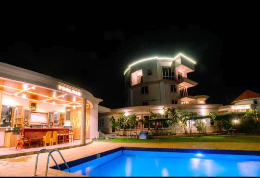 Property Exterior with outdoor swimming pool Photo Grik Hotel - Entebbe, Uganda Central Region