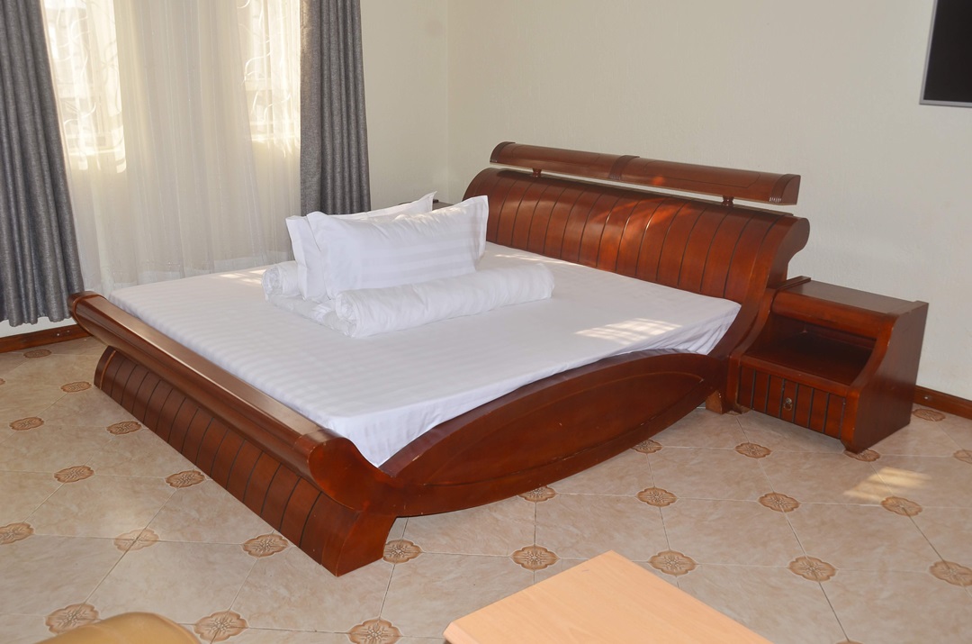 Suite Bedroom Photo Migingo Suites Entebbe, Uganda Central Region