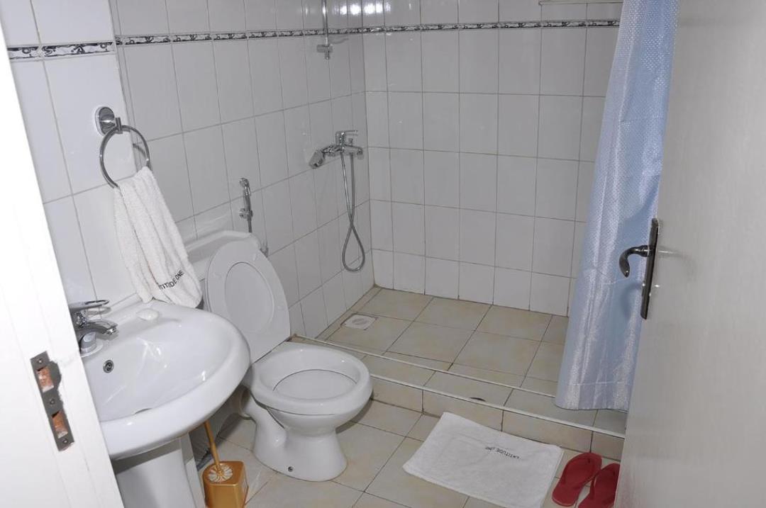 Toilet Photo Latitude 1 Suites Apartments,Kampala Uganda Central Region