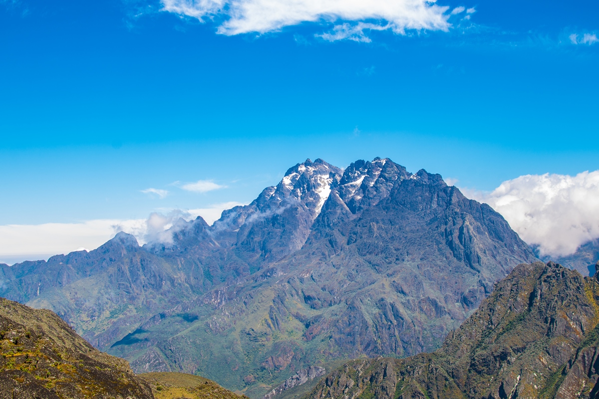 A photograph of the Rwenzori Mountain ranges captured in Rwenzori Mountains National Park in Western Uganda.