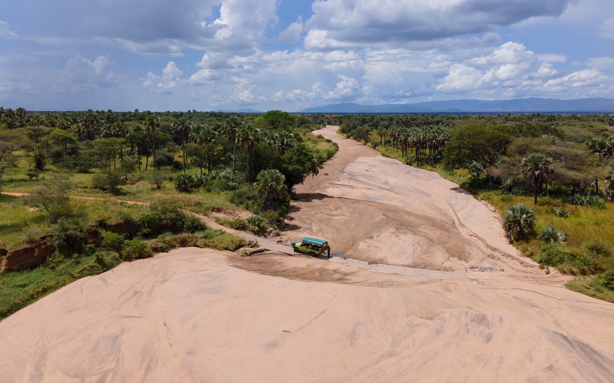 A photograph of the dry Kidepo river captured during a safari drive in Kidepo Valley National Park in Karamoja region in North-Eastern Uganda.