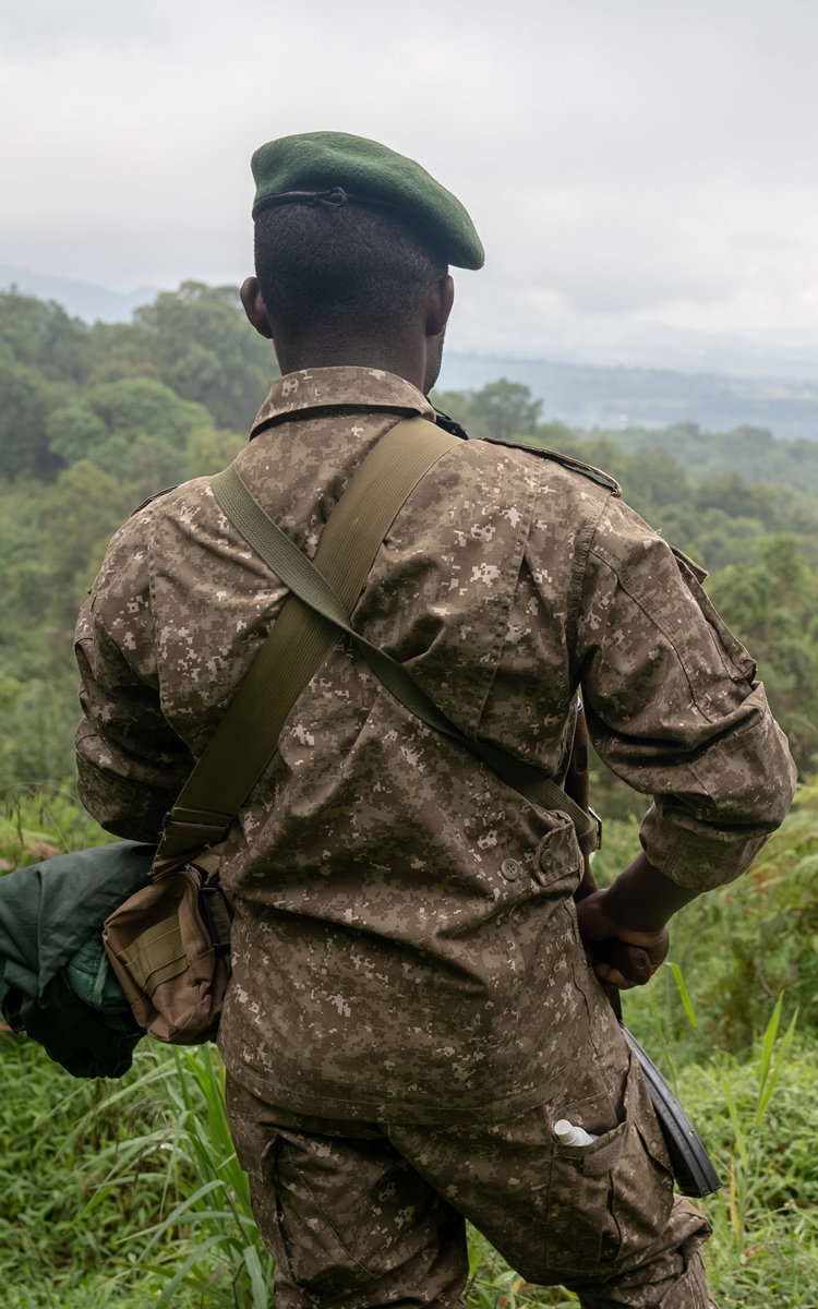 A photograph of a game ranger captured in Mgahinga Gorilla National Park in South-Western Uganda.