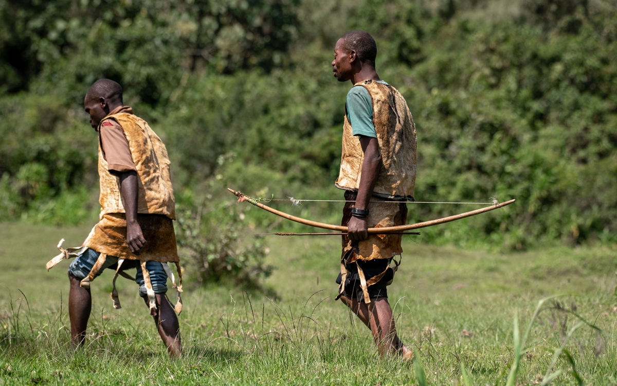 A photograph of two Batwa (pygmy) indigenous people encountered during the Batwa Trail Experience in Mgahinga Gorilla National Park in South-Western Uganda.