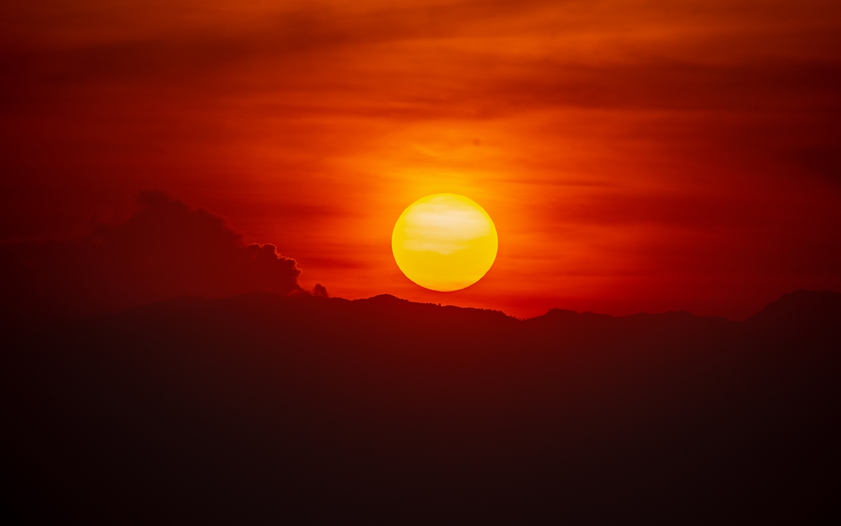 A photogragh of the African sunset captured during a safari game drive in Queen Elizabeth National Park in the Western Region of Uganda.