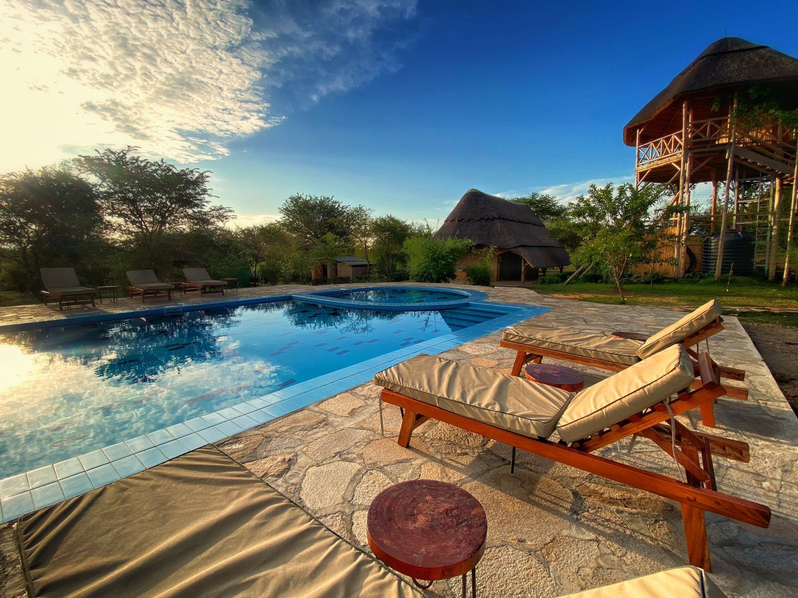 Pool chairs Photo Murchison Falls Bamboo Village Lodge, Uganda North Western Region