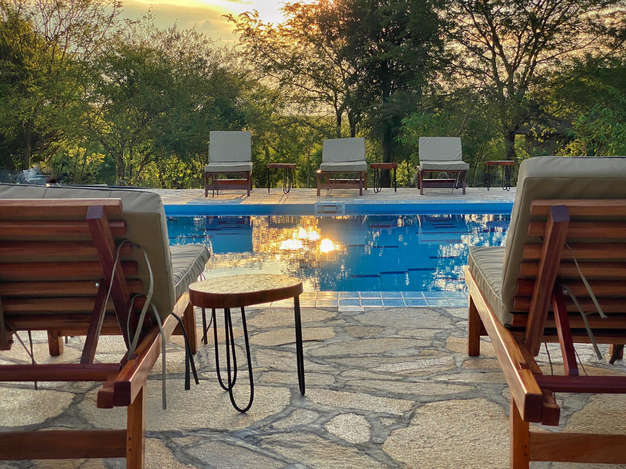 Pool chairs Photo Murchison Falls Bamboo Village Lodge, Uganda North Western Region 1