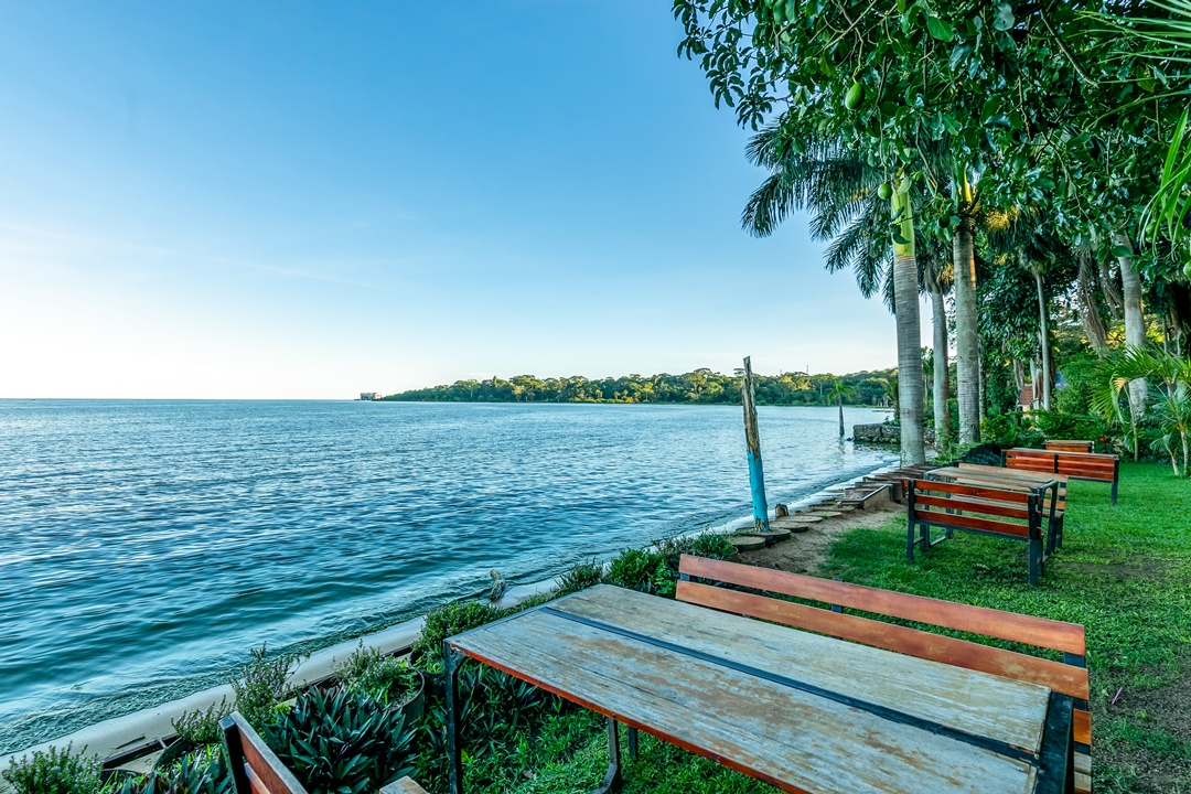 Lake side Chairs Photo Saffron Beach Bistro & Cottages Entebbe Uganda Central Region