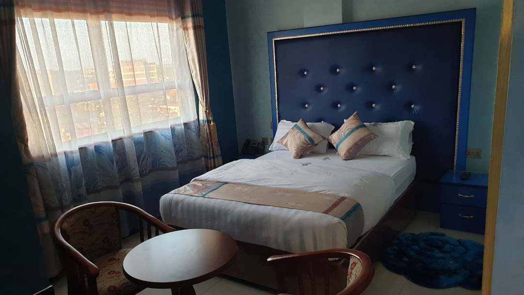 Standard Double Bedroom Photo Signature Suites & Hotel Entebbe Uganda Central Region