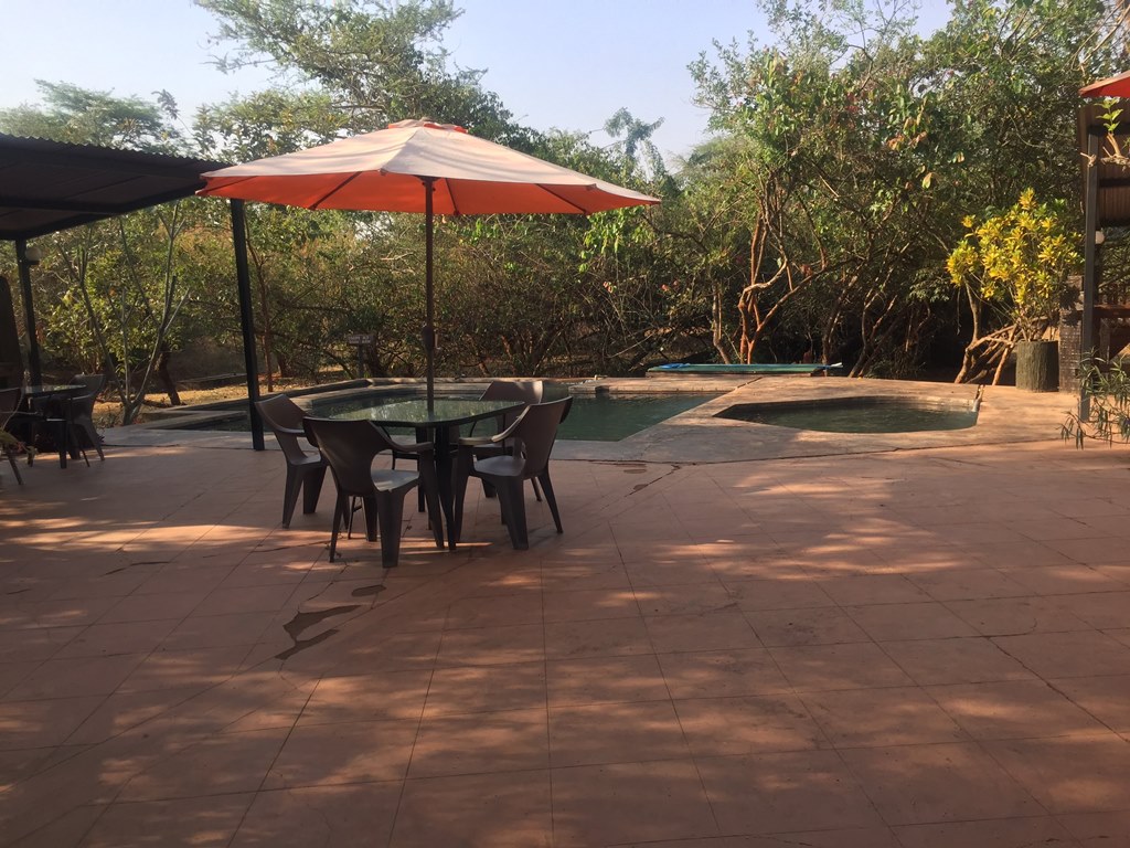 Poolside chairs Photo Amuka Safari Lodge Nakasongola Uganda Northern Western Region