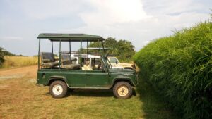 Photograph of a tourist vehicle captured from Lake Albert Safari Lodge Buliisa Uganda Western Region