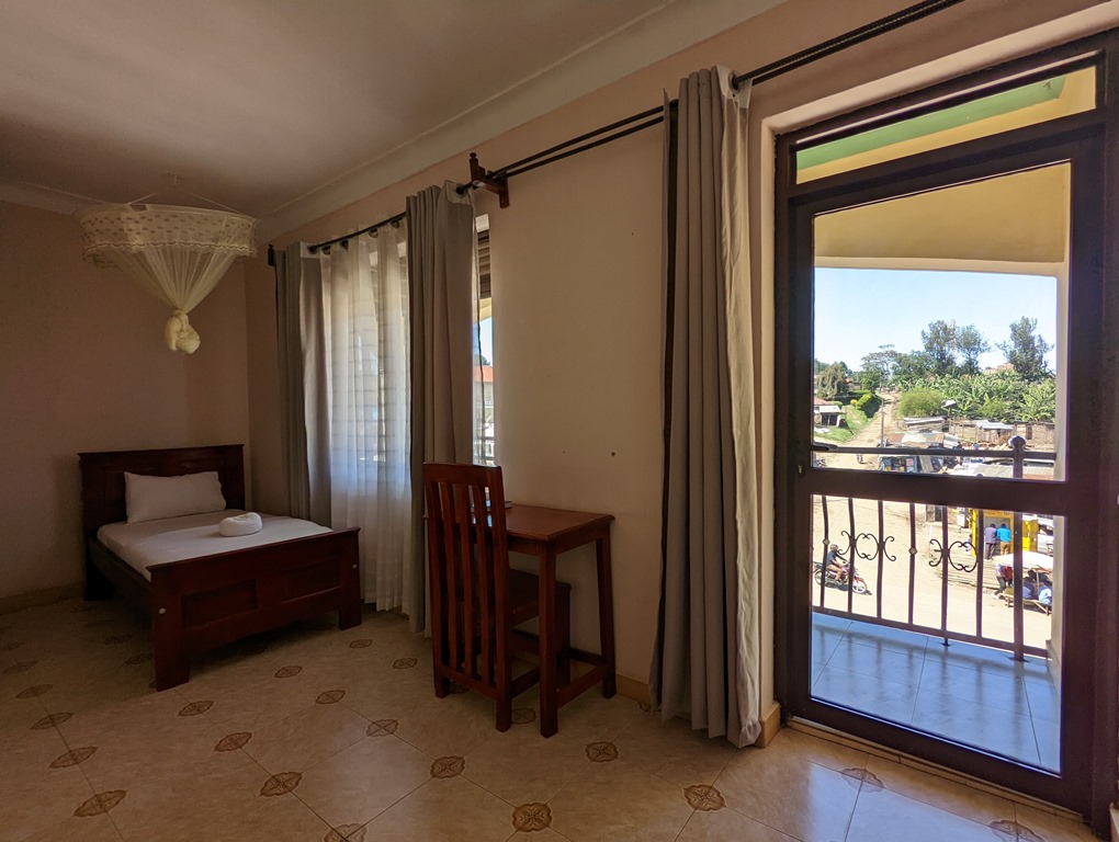 Standard Double Bedroom with Balcony Photo Kasenene Legacy Hotel Fort Portal Uganda Western Region