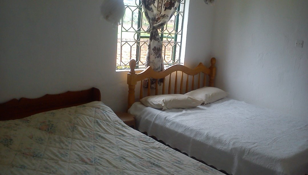 Standard Twin Bedroom Photo Maasai Backpackers Home Fort Portal Uganda Western Region