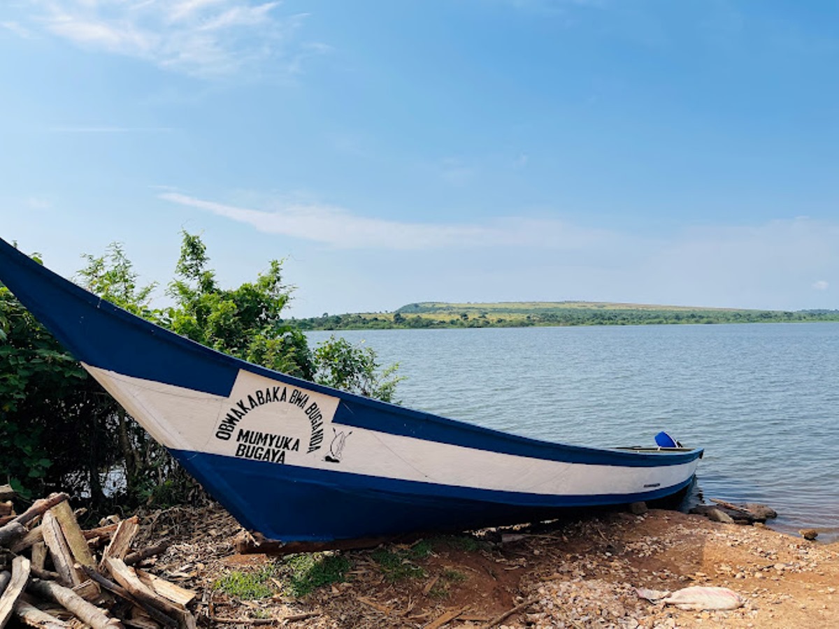 A photograph of a canoe boat docked on Buvuma Island located in Lake Victoria in Uganda