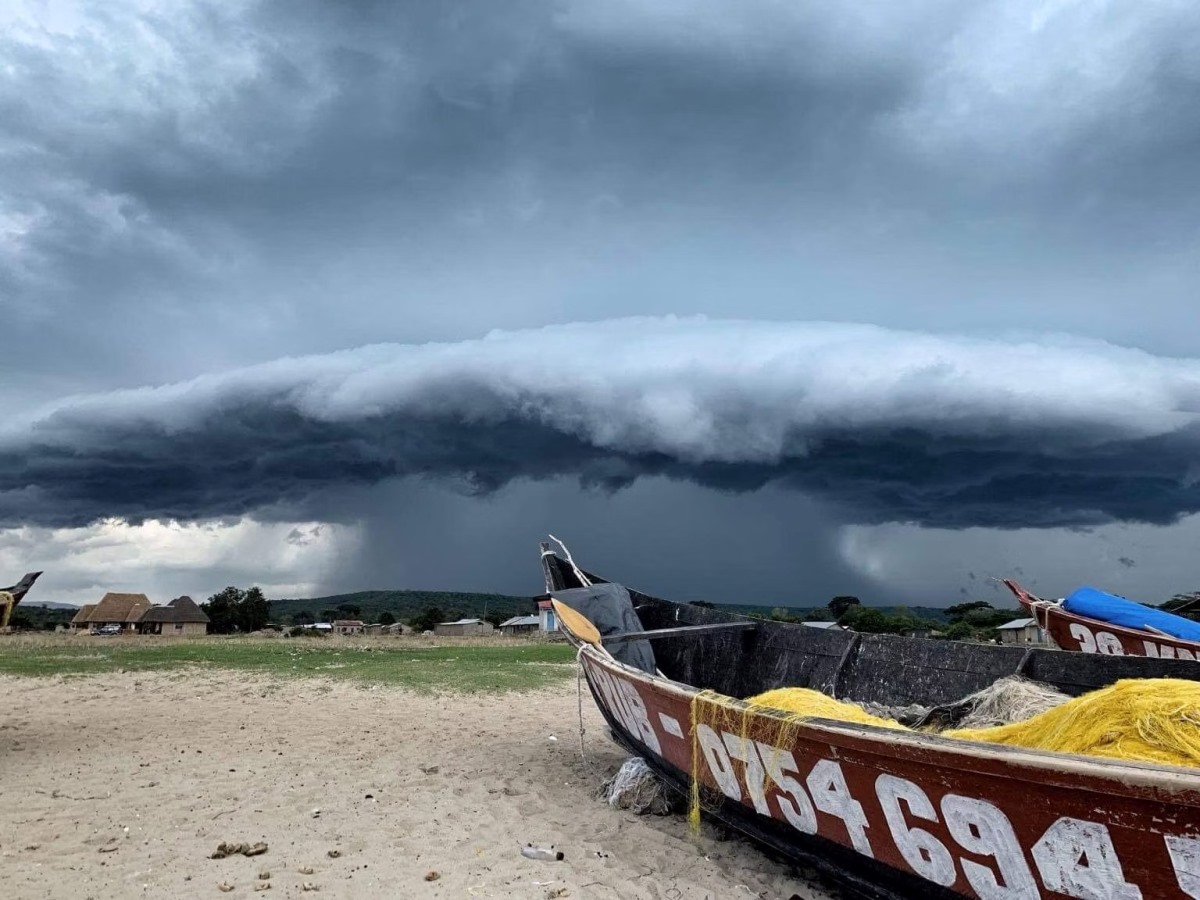 A photograph of a boat docked on the shores of Lake Albert taken during a tour to Lake Albert in the Albertine Rift in Uganda