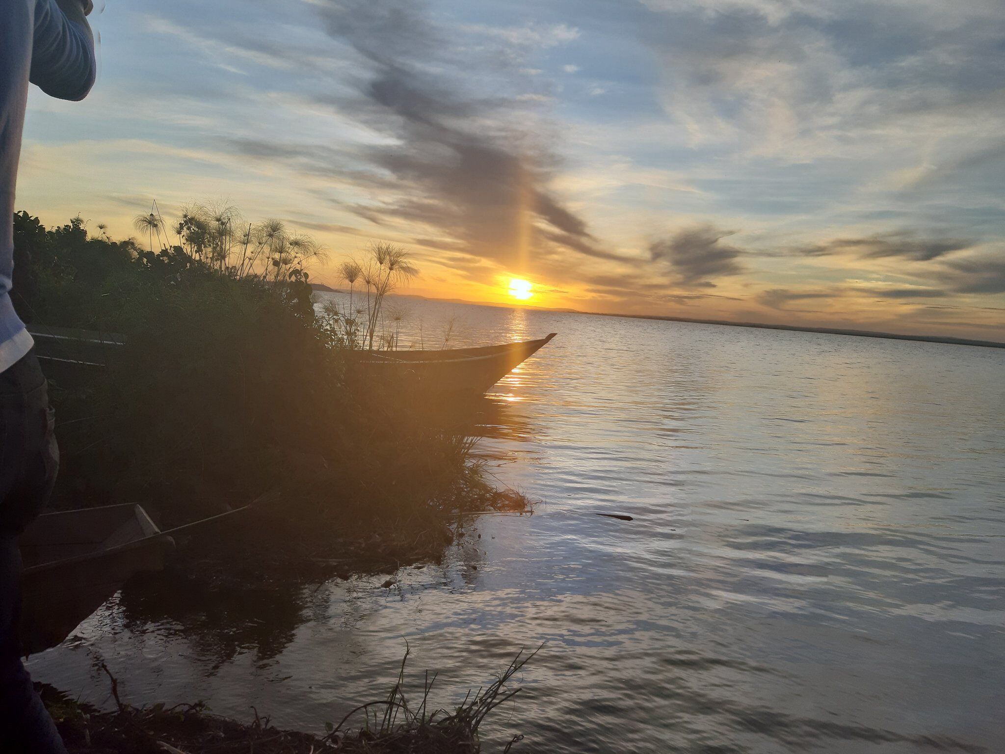 A photograph of the sunset taken during a sunset cruise at Lake Wamala in the Central region of Uganda.