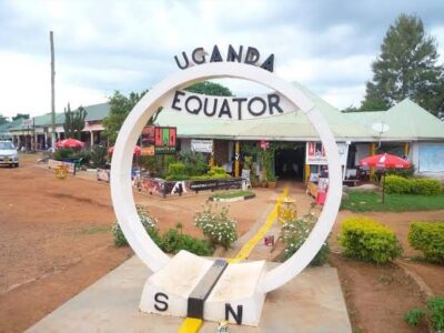 A photograph of the Uganda Equator in Kayabwe, Uganda taken during an adventure tour