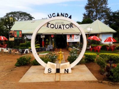 A photograph of the Uganda Equator in Kayabwe, Uganda taken during an adventure tour