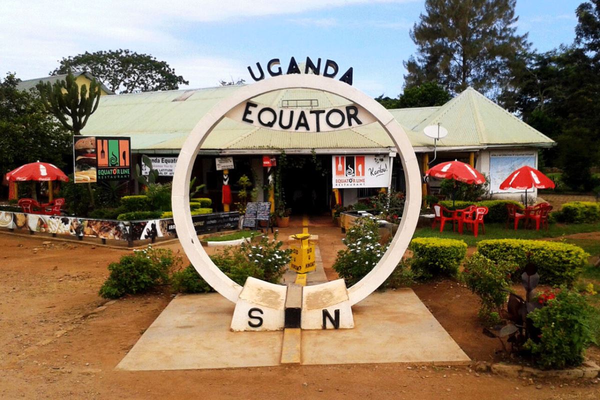 A photograph of the Uganda Equator in Kayabwe, Uganda taken during an adventure tour