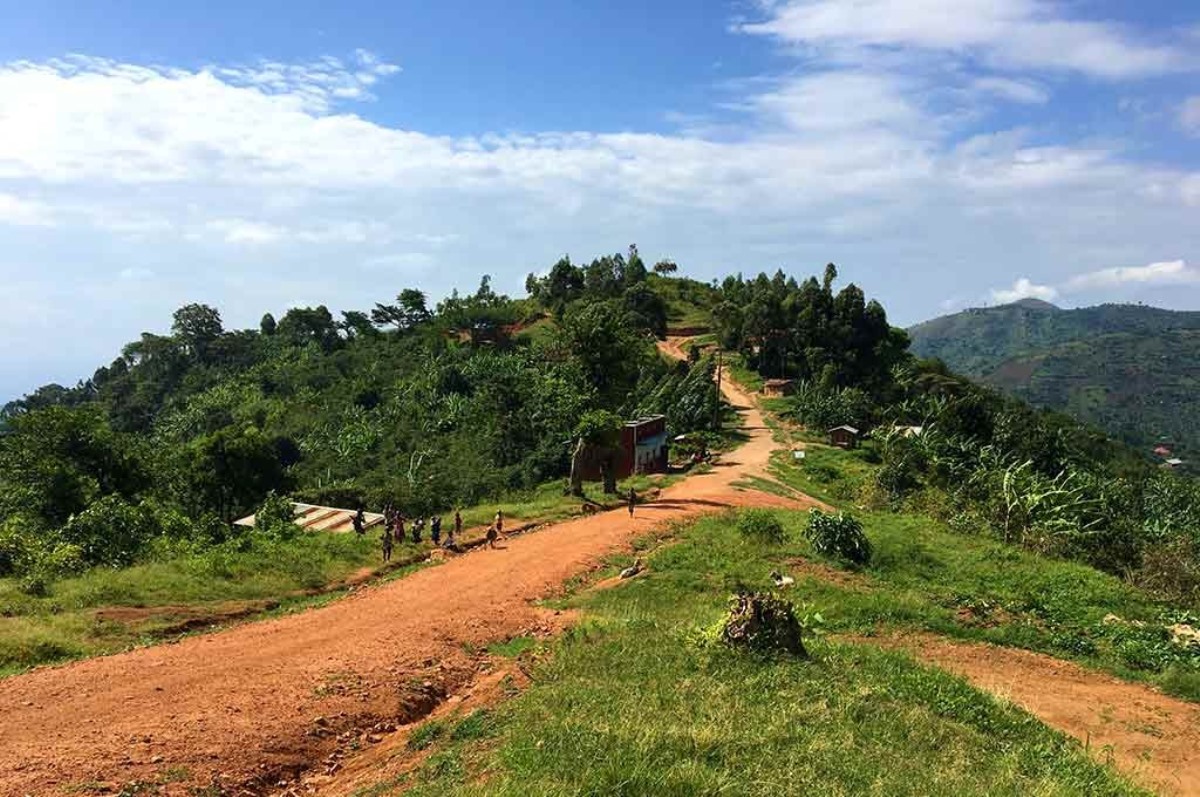 A photograph of a murram road taken during a village tour in Rubona located along Fort Portal-Kasese-Mpondwe Road in Uganda