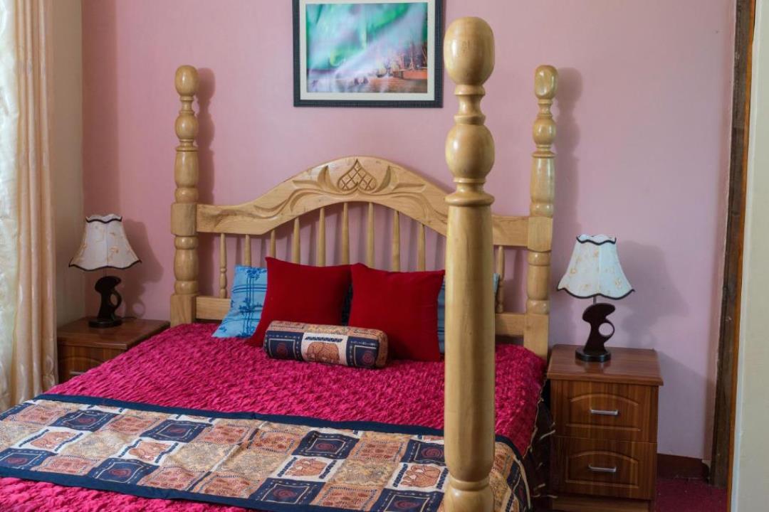 Deluxe Double Bedroom Photo Mirembe Country Home Hotel Entebbe,Uganda Central Region 1