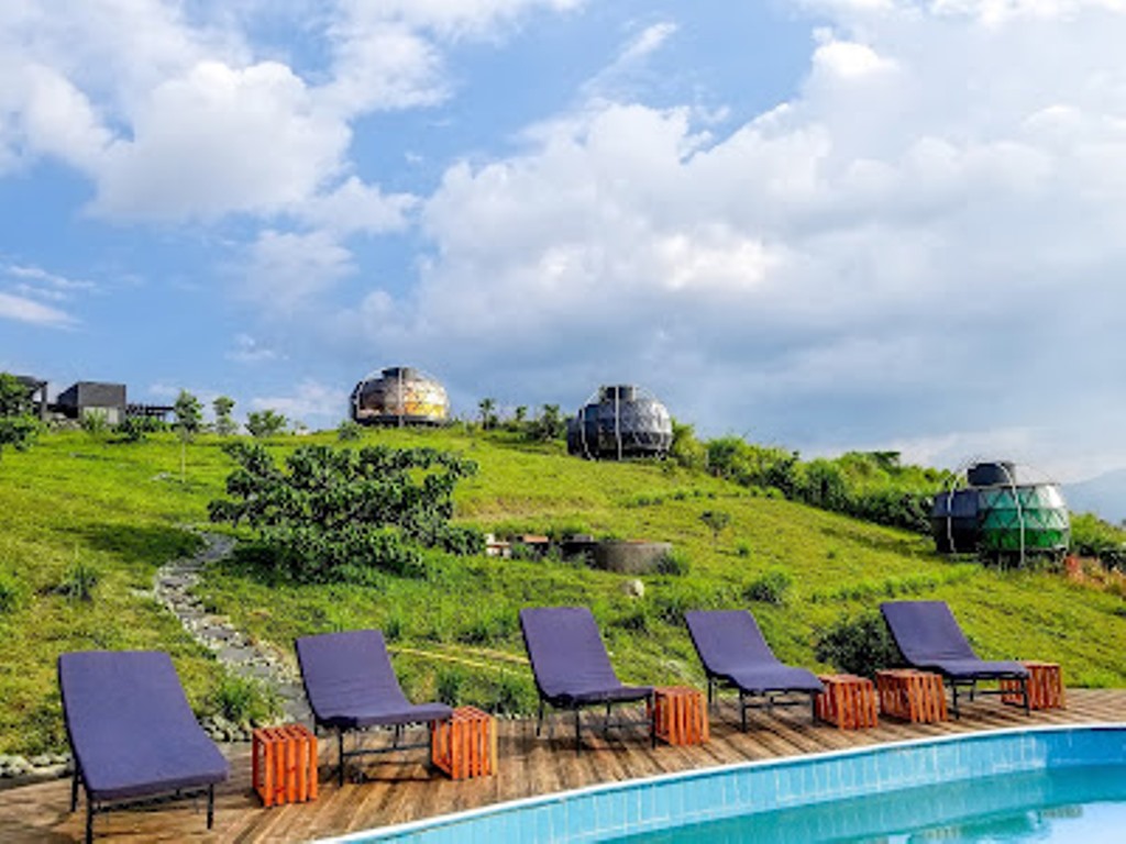 Pool side Chairs Photo Aramaga Rift Valley Lodge Fort Portal,Uganda Western Region