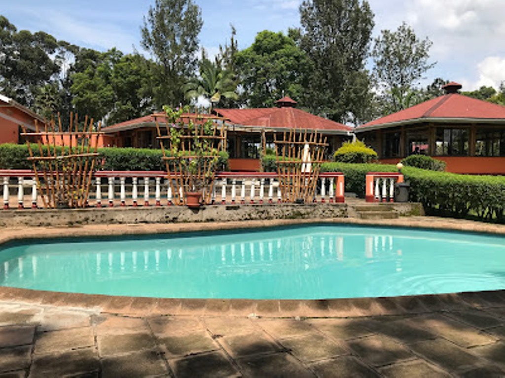 Outdoor swimming pool Photo Kluges Guest Farm Lodge,Kibale Forest National Park Fort Portal Uganda Western Region 1