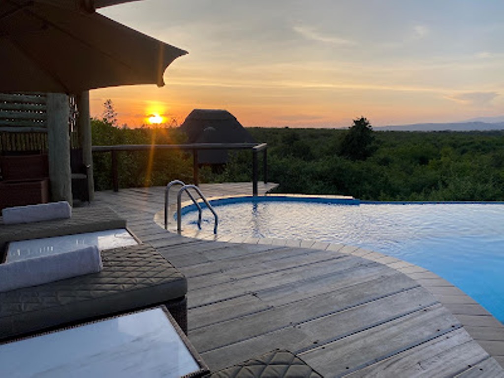 Pool side chairs Photo Buffalo Safari Lodge Kasese Uganda Western Region