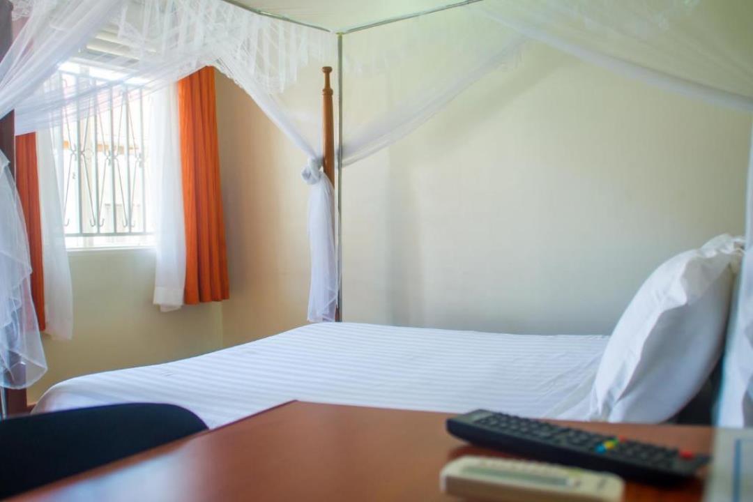 Single Standard Bedroom Photo Sandton Hotel Kasese Uganda Western Region 1