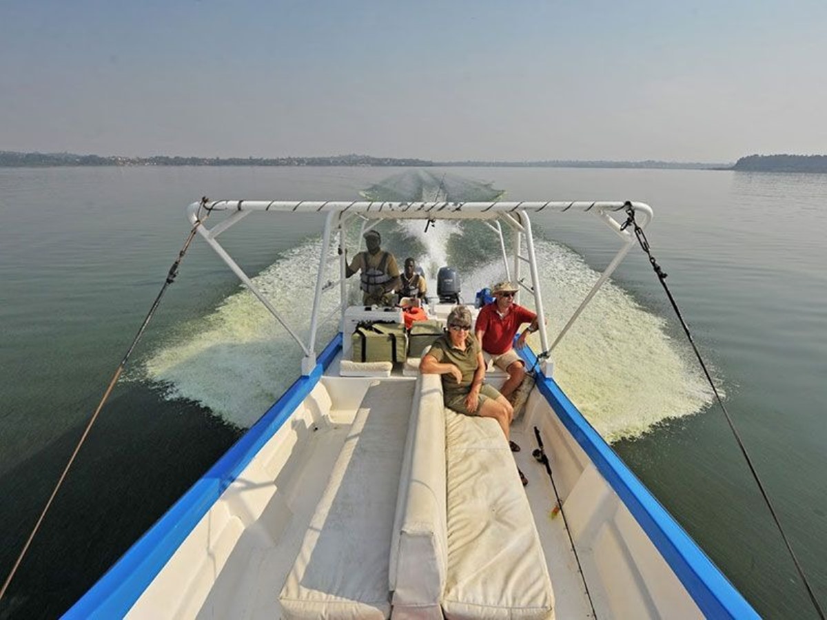 A photograph of tourists taken during a Lake Victoria Fishing trip in Uganda.