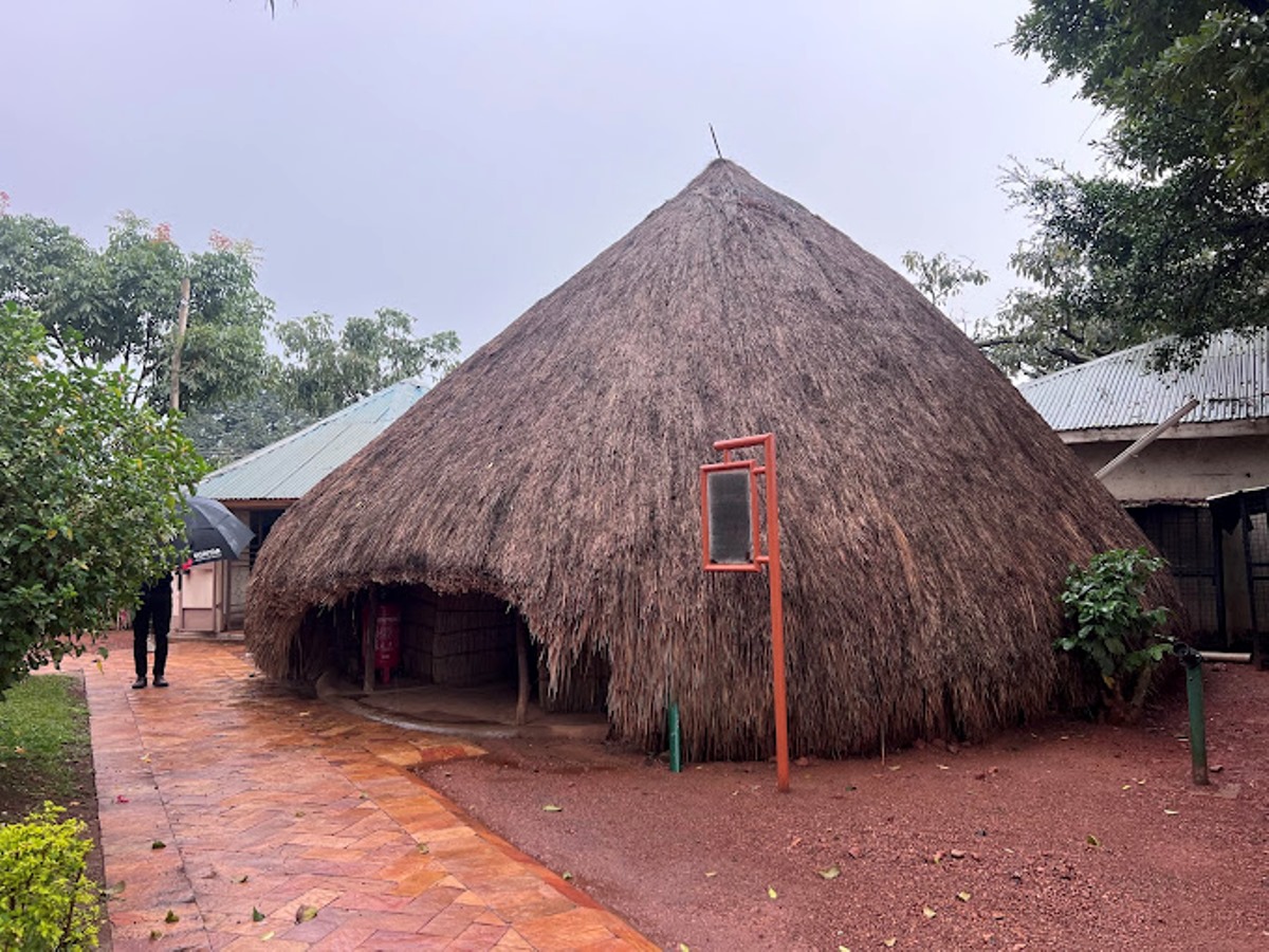 A photograph showing one of the grass-thatched houses taken during a Cultural tour to the Kasubi Tombs in Central Uganda.