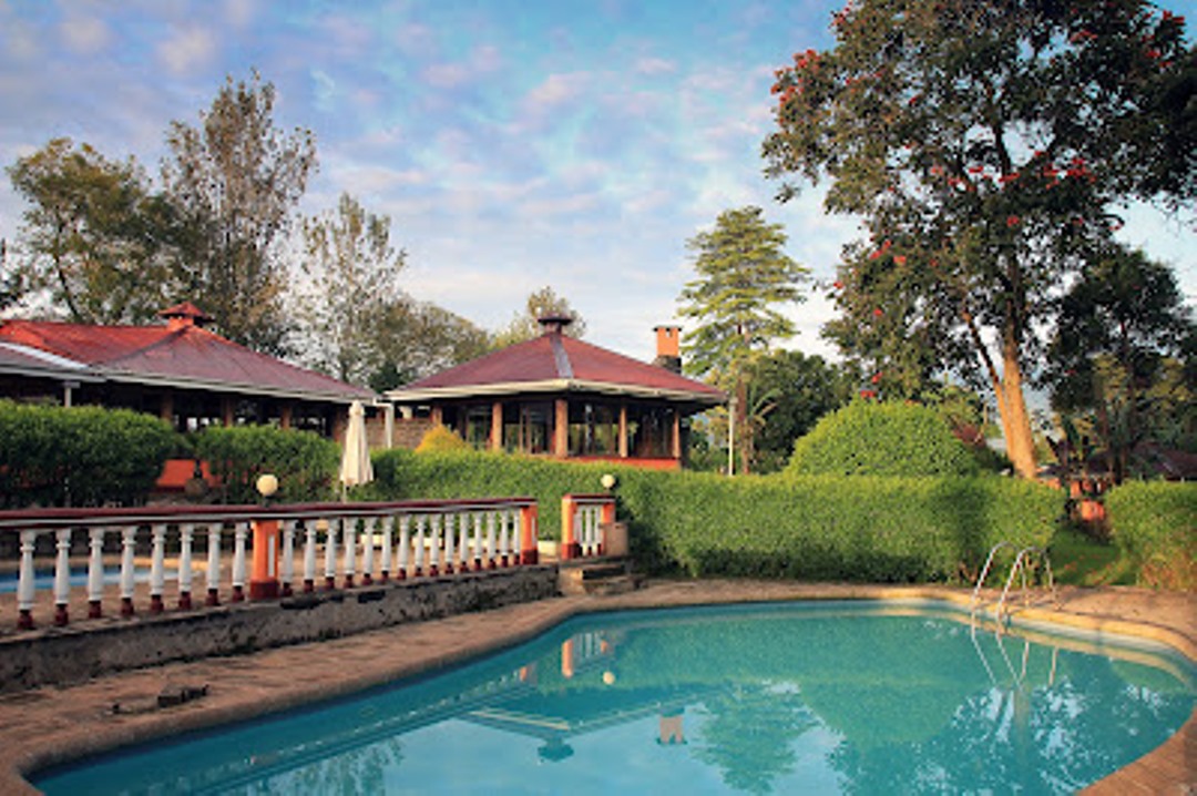 Property Exterior with pool view Photo Kluges Guest Farm Lodge,Kibale Forest National Park Fort Portal Uganda Western Region