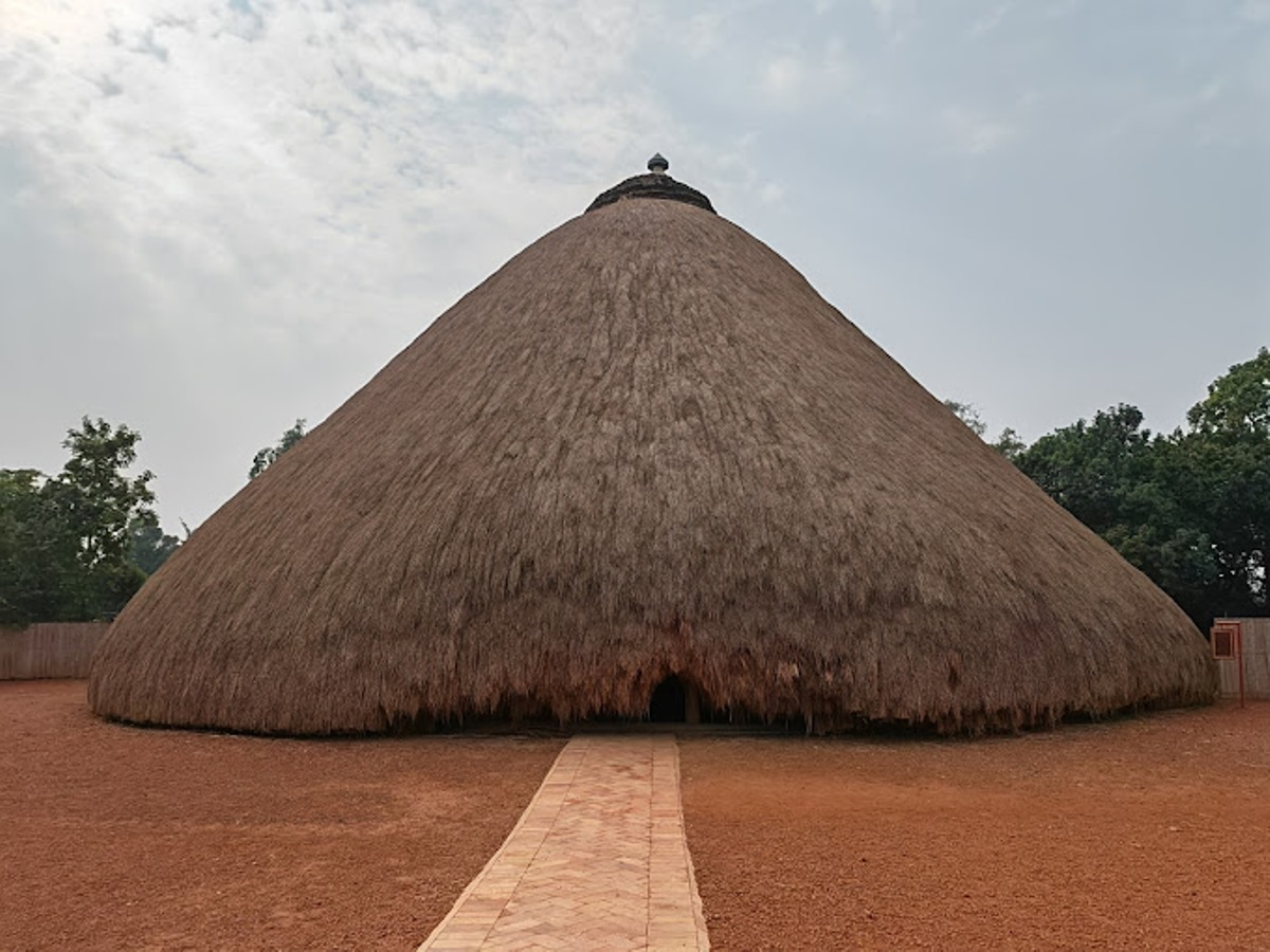 A photograph showing one of the grass-thatched houses taken during a Cultural tour to the Kasubi Tombs in Central Uganda.