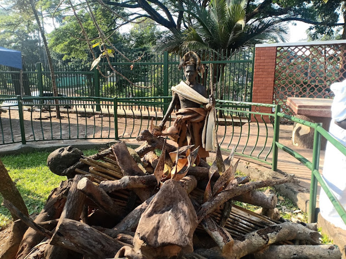 A photograph of the sculptures exhibiting the burning of the Uganda Martyrs taken during a Kampala City Tour in Central Uganda.