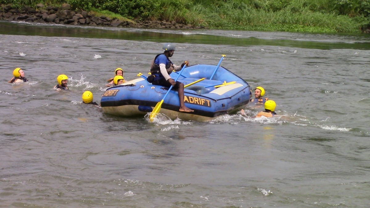 A photograph of tourists swimming taken during a rafting tour in Jinja in Easter Uganda.