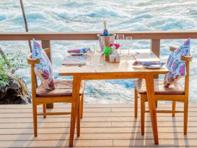 A photograph of the table setup at Wildwaters Lodge in Uganda