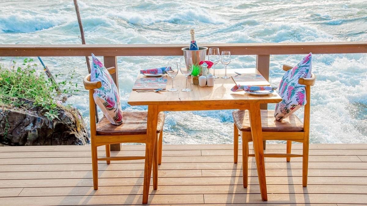 A photograph of the table setup at Wildwaters Lodge in Uganda