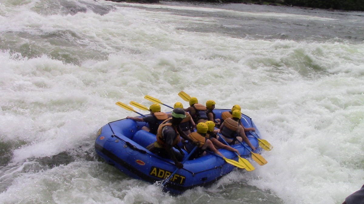 A photograph of tourists rafting taken during a rafting tour in Jinja in Eastern Uganda.