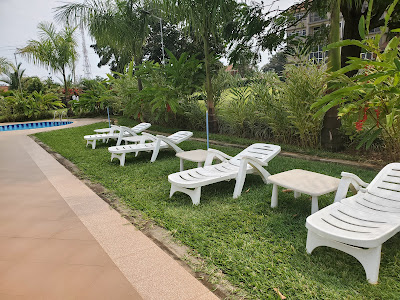 Outdoor swimming pool chairs Photo Mbale Courts View Hotel Mbale Uganda Eastern Region