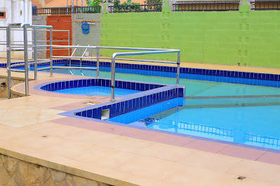 Outdoor swimming pool Photo Golden Suites Hotel Entebbe Uganda Central Region 1