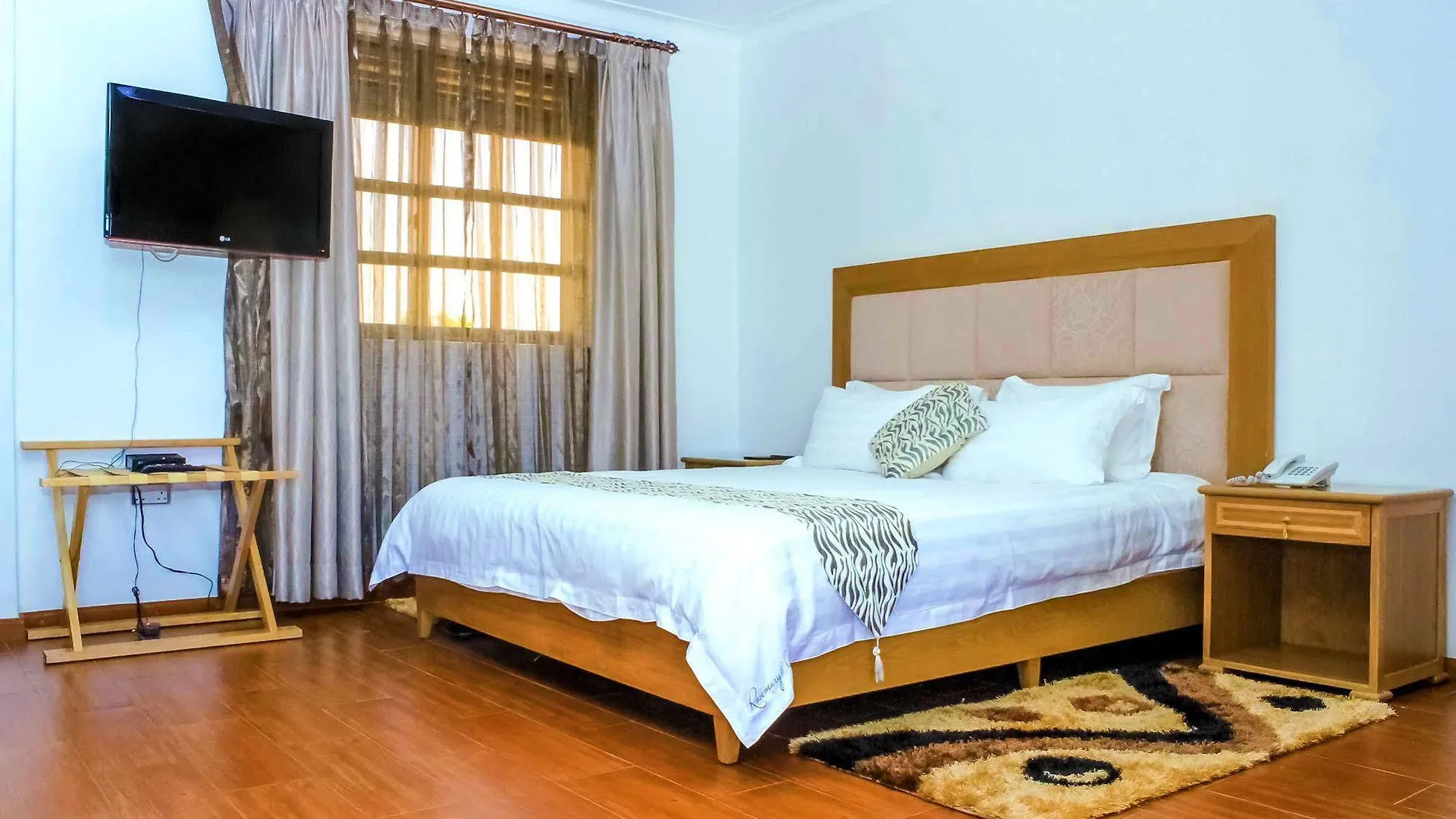 Deluxe Studio Bedroom Photo Rosemary Courts Hotel Entebbe Uganda Central Region