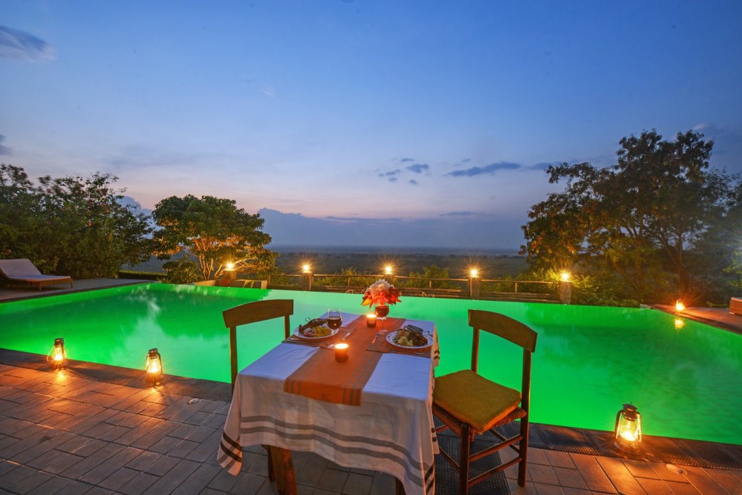 Poolside Dining area Photo Elephant Hab Lodge Kasese Uganda Western Region