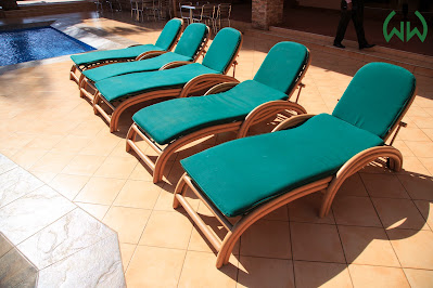 Pool side chairs Photo Wash And Wills Hotel Mbale Uganda Eastern Region