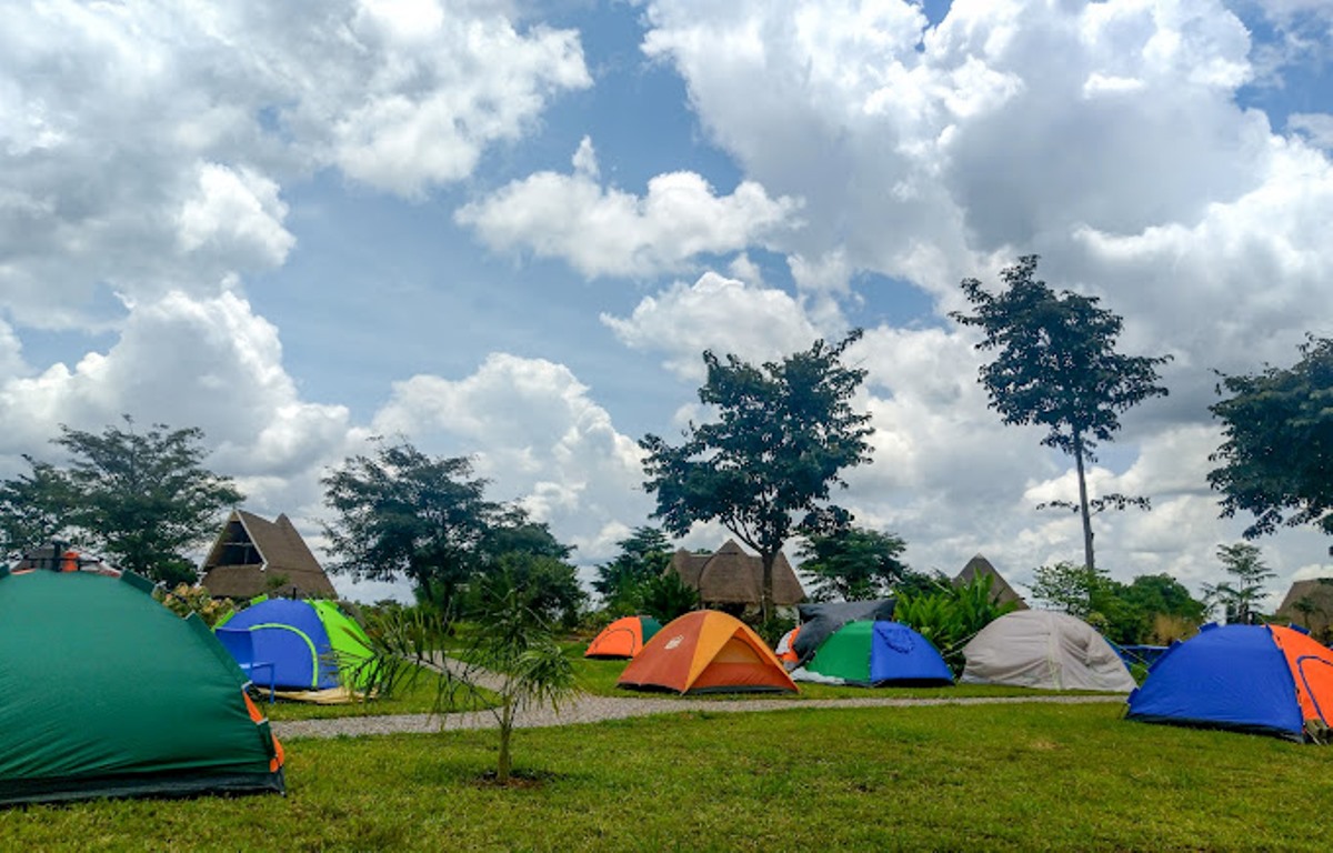 A photograph of tourists' camp setting taken in Kaynela Farms Ltd in Kayunga District, Uganda.