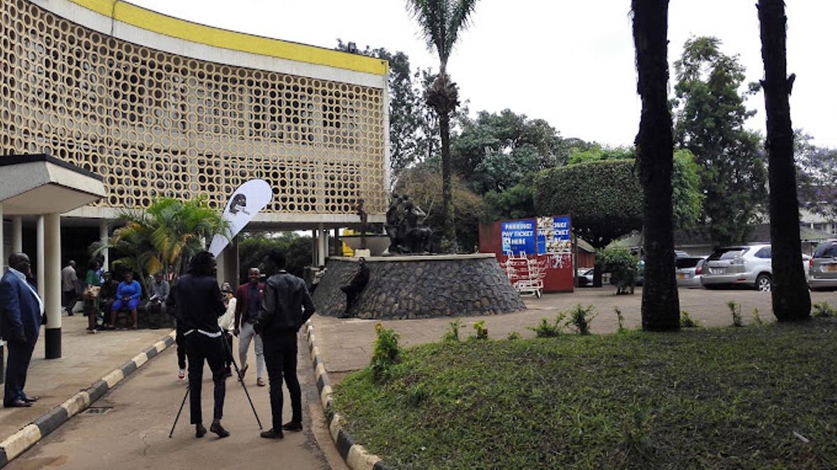 A photograph of the Uganda National Cultural Centre in Kampala, Uganda.