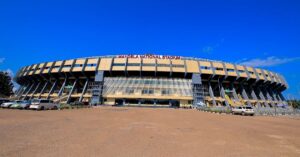 A photograph showing the entrance to Mandela National Stadium on Namboole Hill in Kira, Uganda.