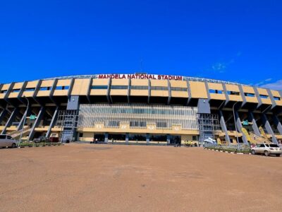 A photograph showing the entrance to Mandela National Stadium on Namboole Hill in Kira, Uganda.