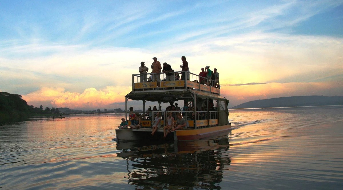 A photograph of tourists taken during a Nile boat cruise on Bujagali Lake.