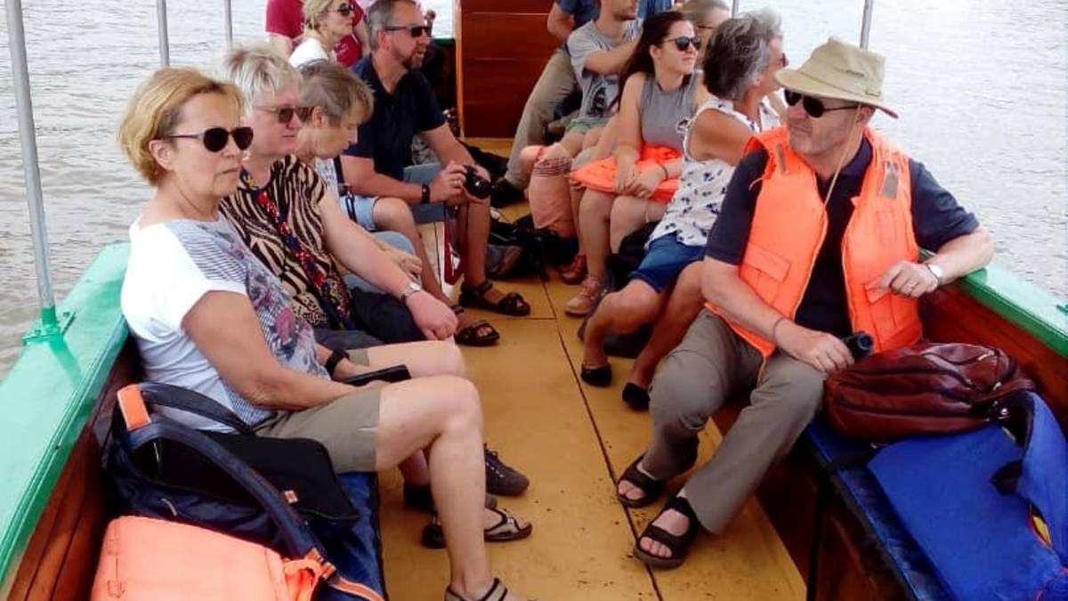 A photograph of tourists taken during the Source of the Nile Cruise in Jinja, Eastern Uganda.