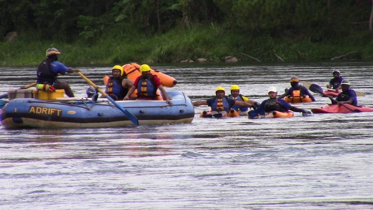 A photograph of tourists river bugging taken during a river bugging tour in Jinja in Eastern Uganda.